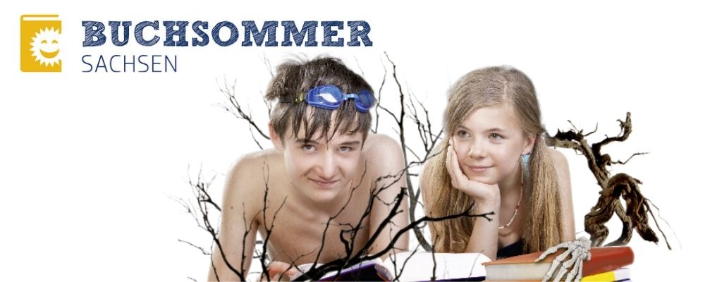 Zwei Jugendliche liegen auf dem Boden und haben Bücher vor sich liegen. Zwei Jugendliche liegen auf dem Boden und haben Bücher vor sich liegen.